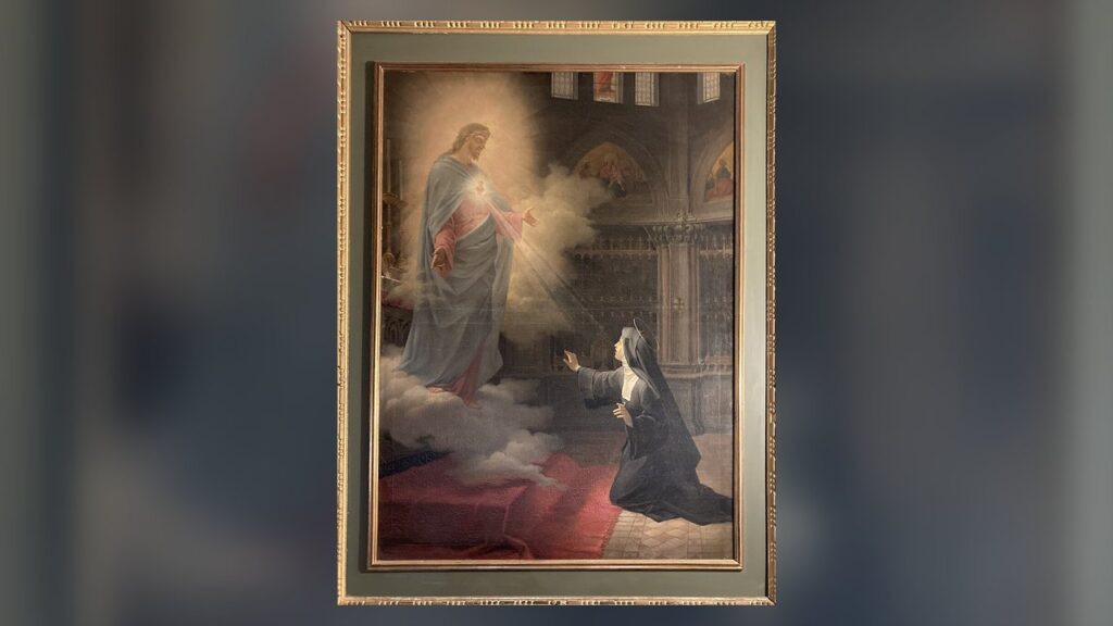 Cristo mostra o Coração a Santa Margarida Maria Alacoque, que difundiu a Hora Santa