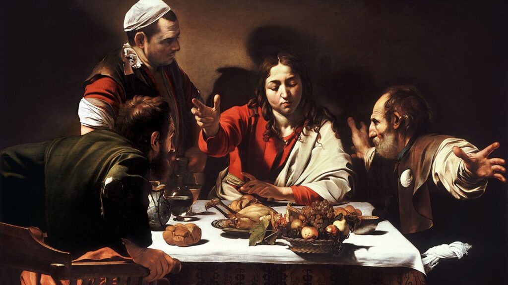 Jesus ressuscitado abençoa o pão diante dos discípulos de Emaús, aparição lida no Tempo Pascal