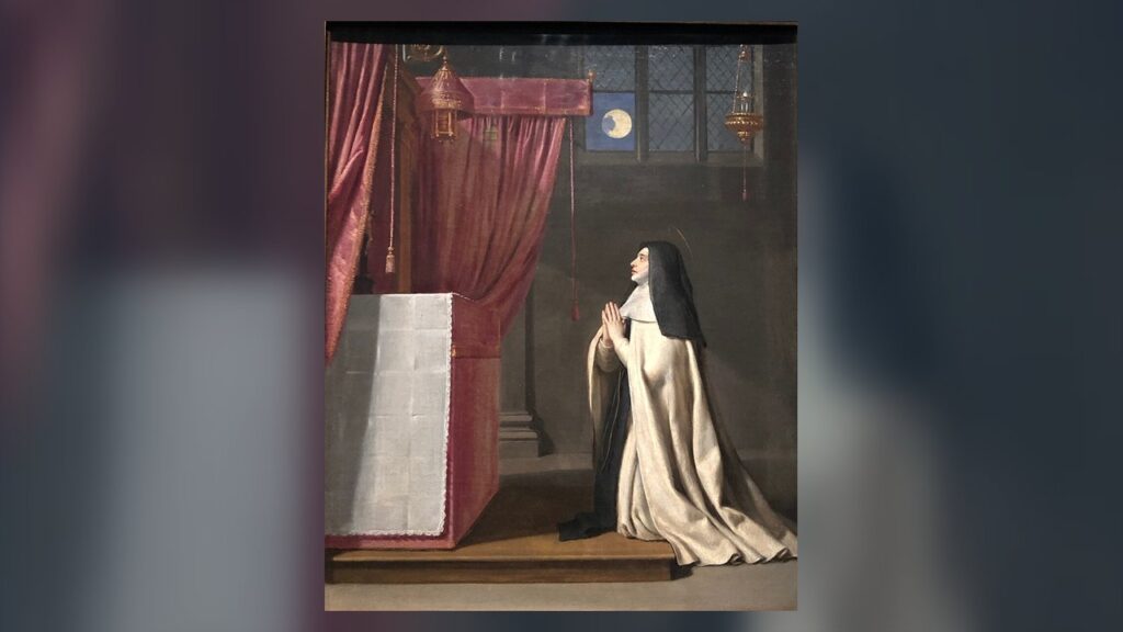 Santa Juliana de Cornillon reza diante do altar e vê a lua com uma mancha, visão que pedia a festa de Corpus Christi