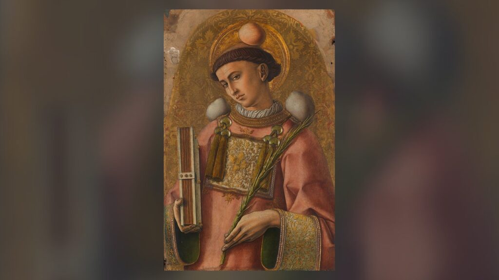 Santo Estêvão vestido com a dalmática, a veste própria do diácono, com o livro e a palma