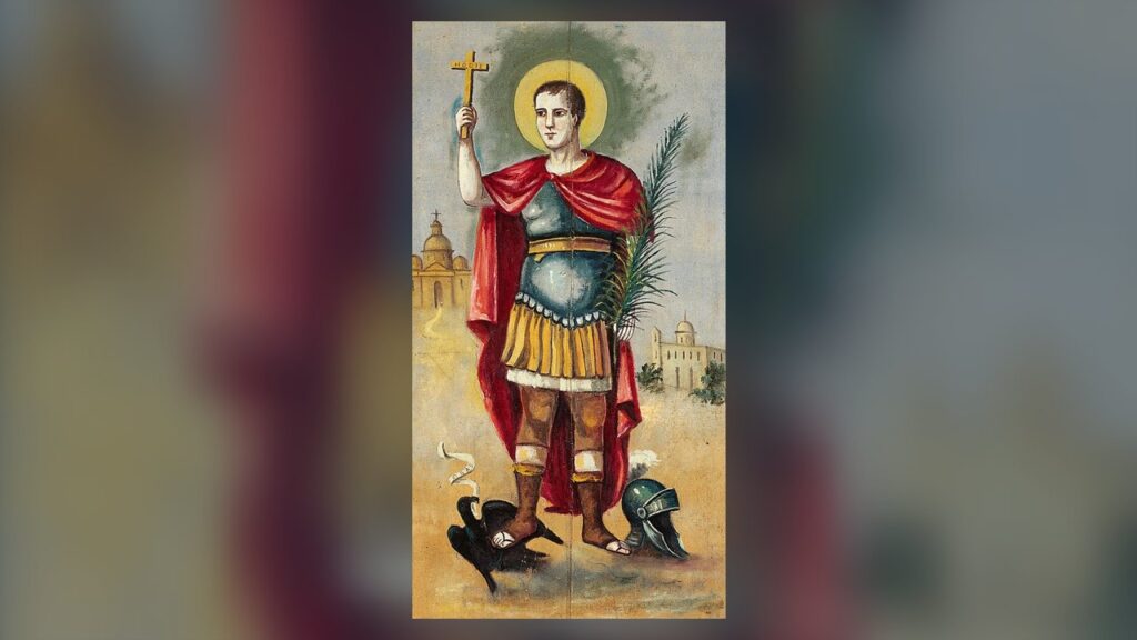 Santo Expedito de soldado romano, com a cruz marcada hodie e o corvo que grita cras sob o pé